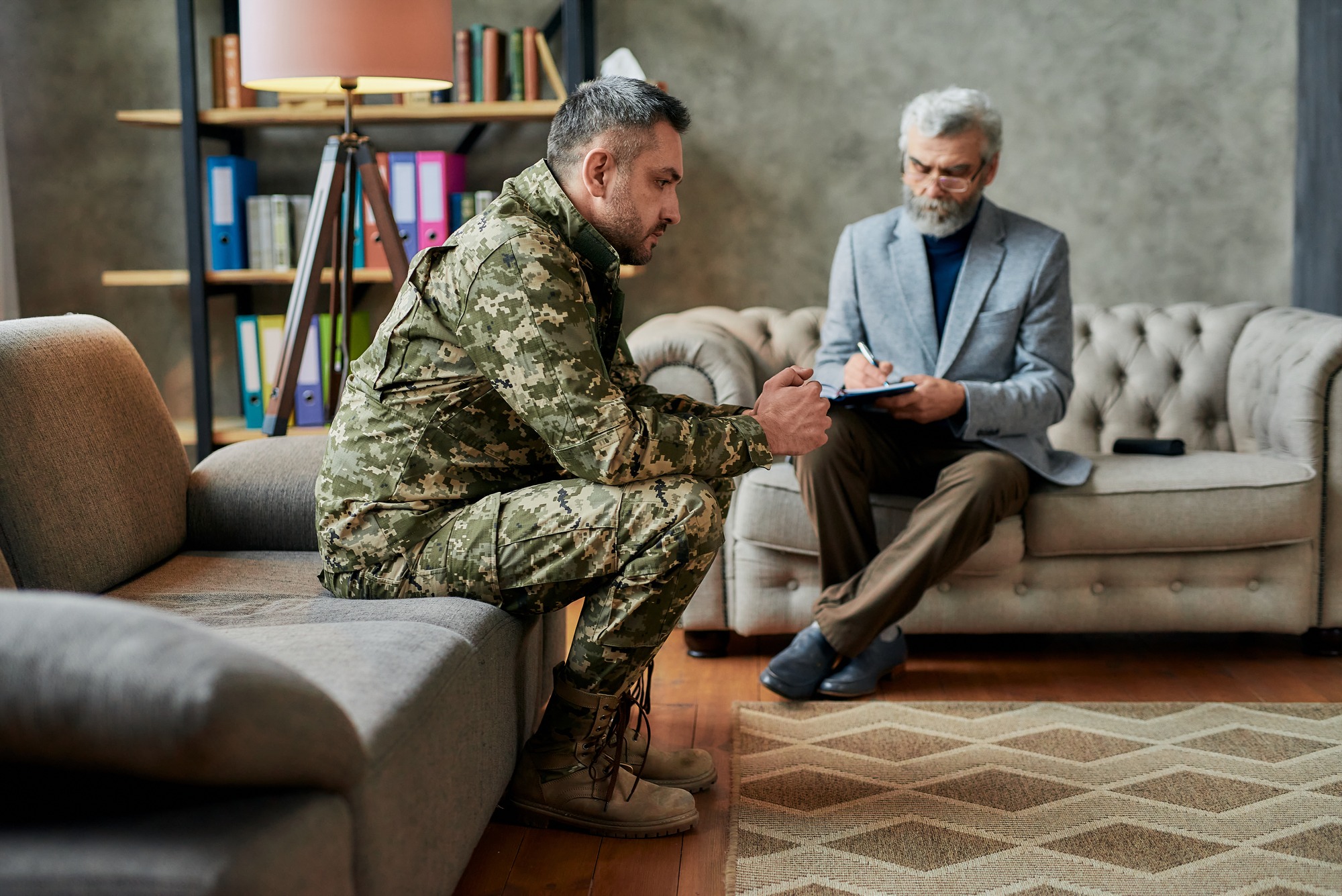 A Southern California therapist providing compassionate guidance to a veteran, highlighting the intersection of military service and the pursuit of mental health