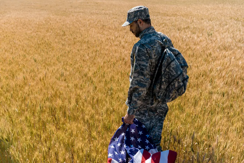 An image capturing the essence of a veteran grappling with PTSD portraying a deep introspection into feelings and the quest for emotional well being