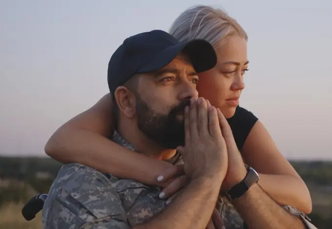 An image representing a family member addressing mental health concerns for their loved one who has experienced trauma while serving in the army